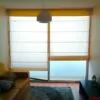 Cortina romana borlón instalada en ventana dormitorio Lima Perú
