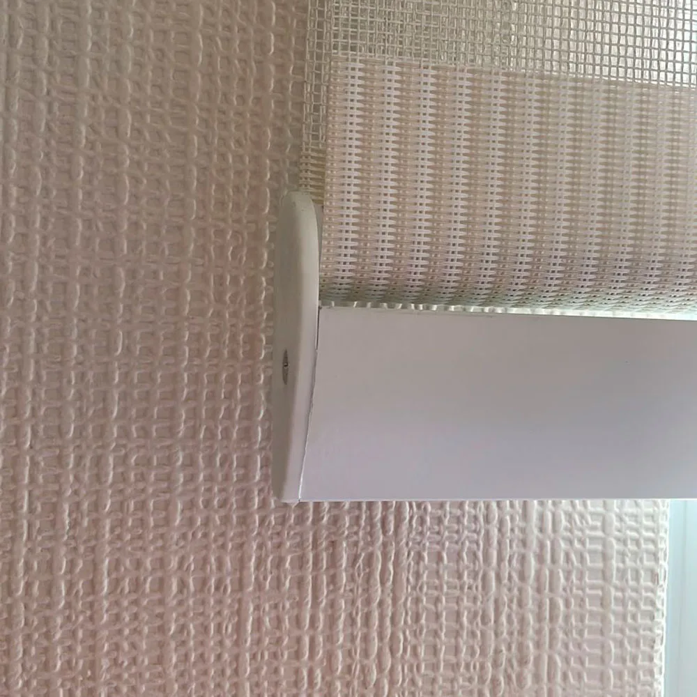 Tapa de plástico inferior para cortinas roller zebra, roller día y noche marca vertilux - Imagen 7